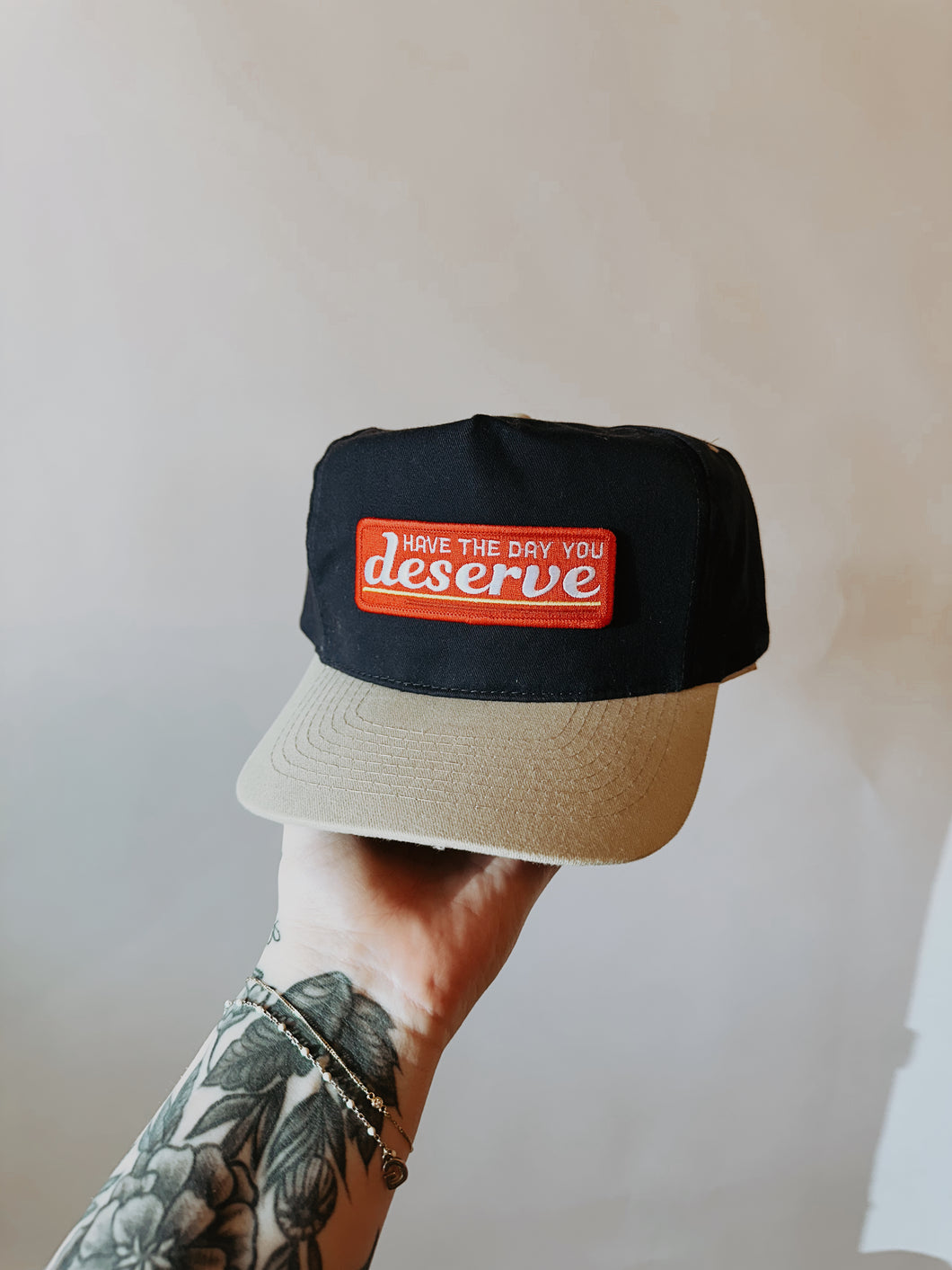 Have The Day You Deserve Trucker Hat