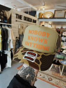 Nobody Knows Anything Trucker Hat