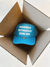 Load image into Gallery viewer, Personally Victimized By Broke Men Trucker Hat
