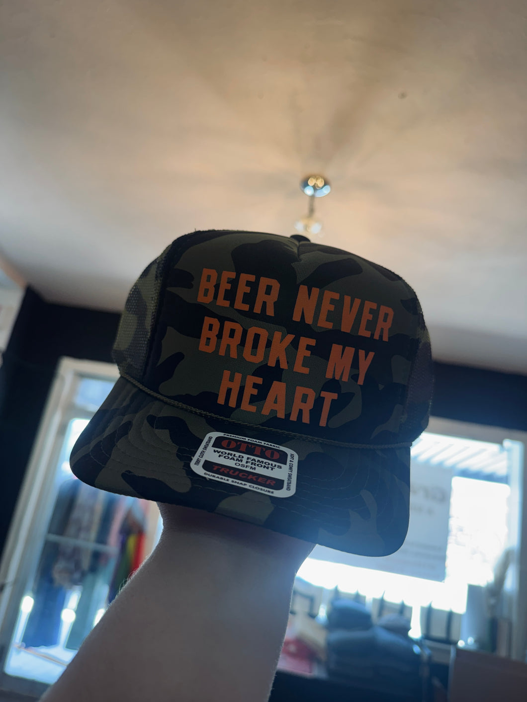 Beer Never Broke My Heart Trucker Hat